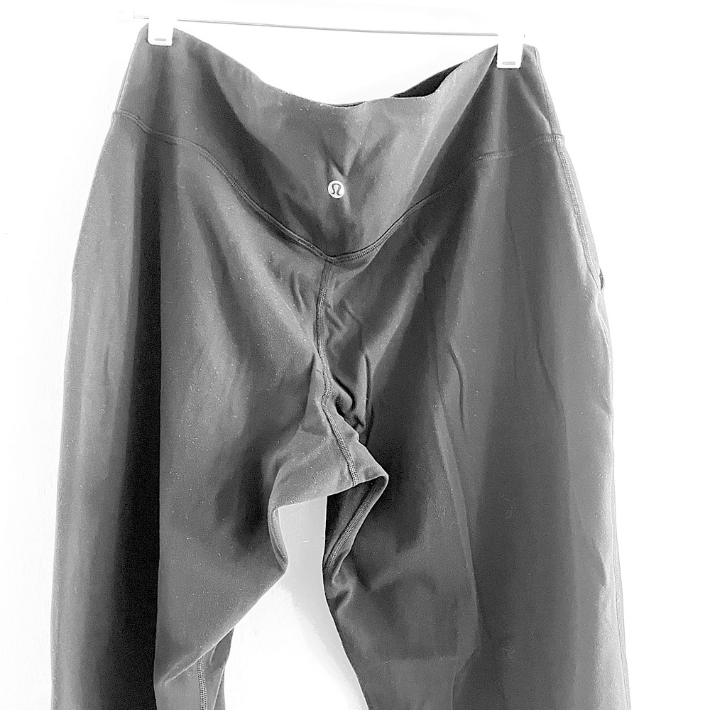 Lululemon size 12 black joggers. Cuffed leg, side pockets.